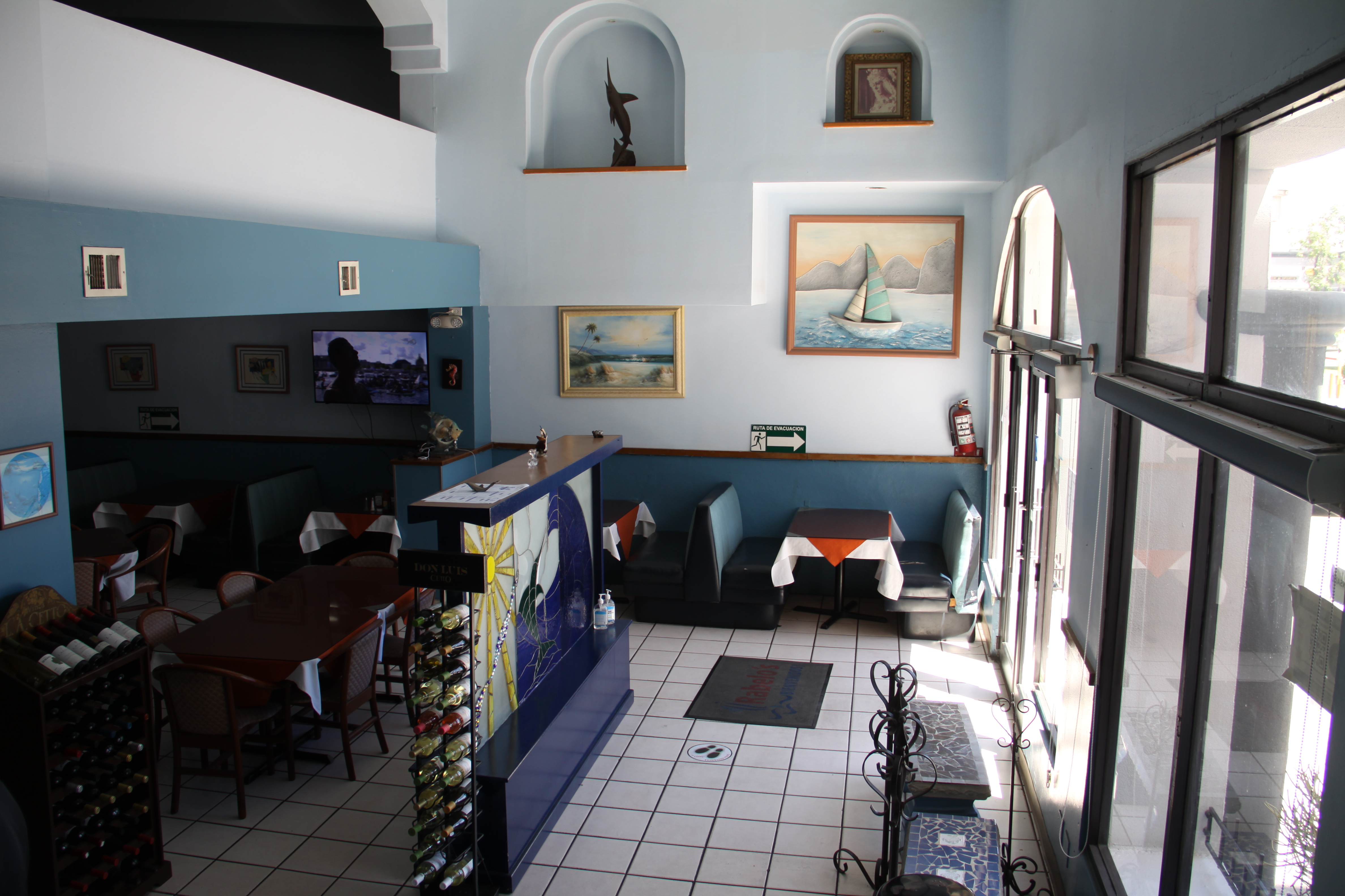 Rabelos Restaurante sign reading Desde 1995